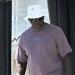Michael Jordan smokes a cigar as he heads out for dinner in Barcelona - as NBA icon soaks up the sun with wife Yvette Prieto on his $15m yacht