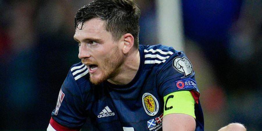 Liverpool face ANOTHER injury concern as Andy Robertson picks up a hamstring scare in Scotland's win over Denmark with Jurgen Klopp also sweating on the fitness of Sadio Mane and Jordan Henderson