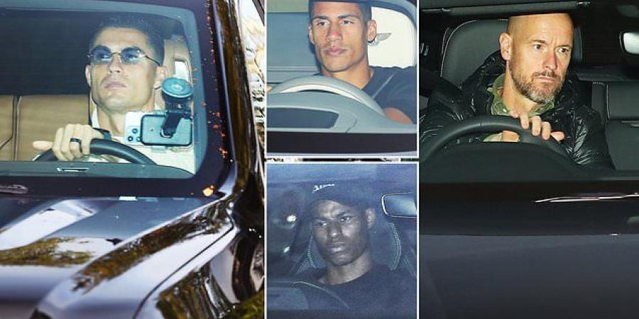 Benched Cristiano Ronaldo cuts a glum figure as he arrives at Carrington after being left on the sidelines... as boss Erik ten Hag begins the inquest after Man United's derby day drubbing 
