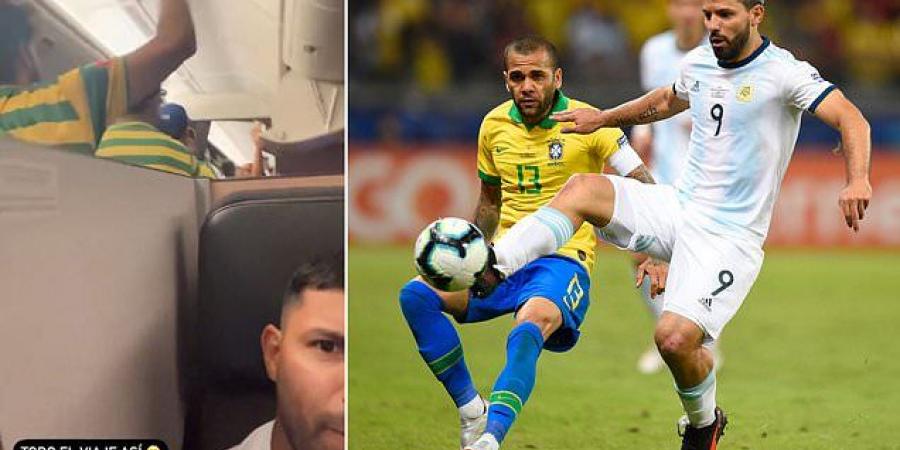 'The whole trip was like this': Miserable Argentina legend Sergio Aguero is surrounded by singing Brazil fans who partied around him on his long flight to Qatar for the World Cup in hilarious video