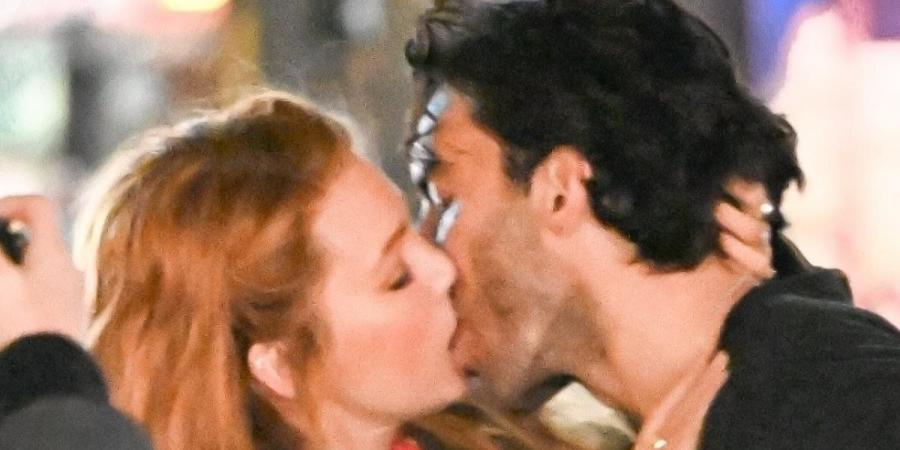 Blake Lively shares a passionate kiss with co-star Justin Baldoni while filming on set of their romance drama movie It Ends With Us