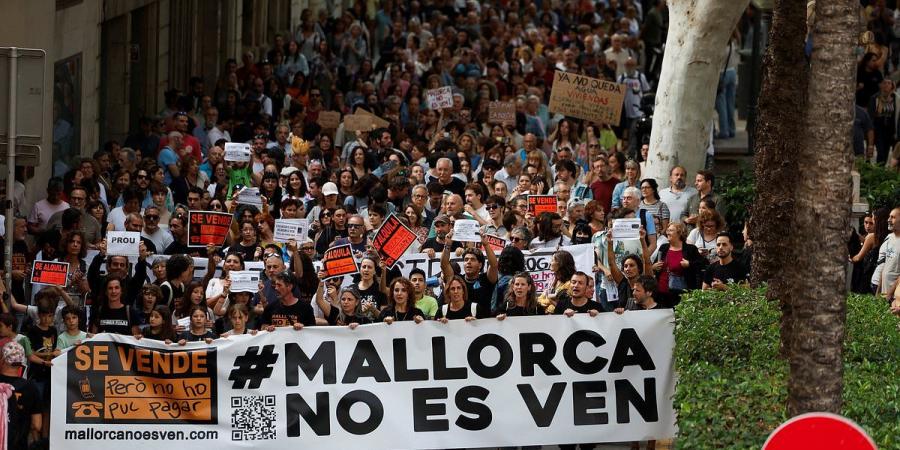 Thousands of demonstrators gather in Mallorca to protest against 'excessive tourism' which has inflated property prices, driven up the cost of living and created traffic chaos
