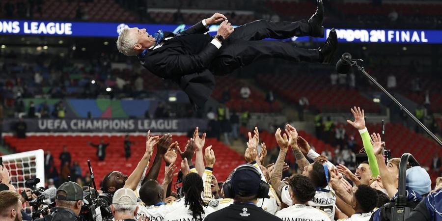 Carlo Ancelotti claims Real Madrid 'are not going to sleep' as Champions League celebrations continue... after the winning players joyously threw their Italian manager in the air