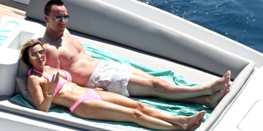 John Terry strips down to his beach shorts as he joins bikini-clad wife Toni aboard a rented yacht during sunshine summer break in Capri