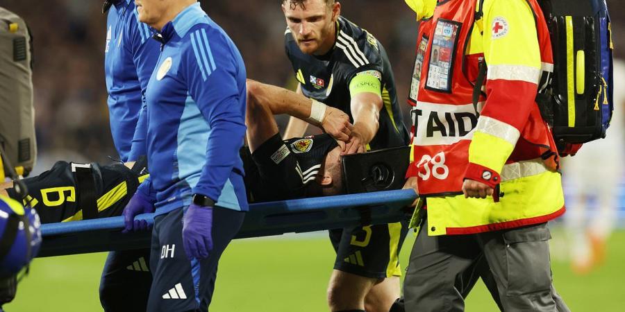 Distraught Arsenal star Kieran Tierney is carried off on a stretcher in Scotland's Euro 2024 clash with Switzerland - after suffering ANOTHER injury following challenge with Dan Ndoye