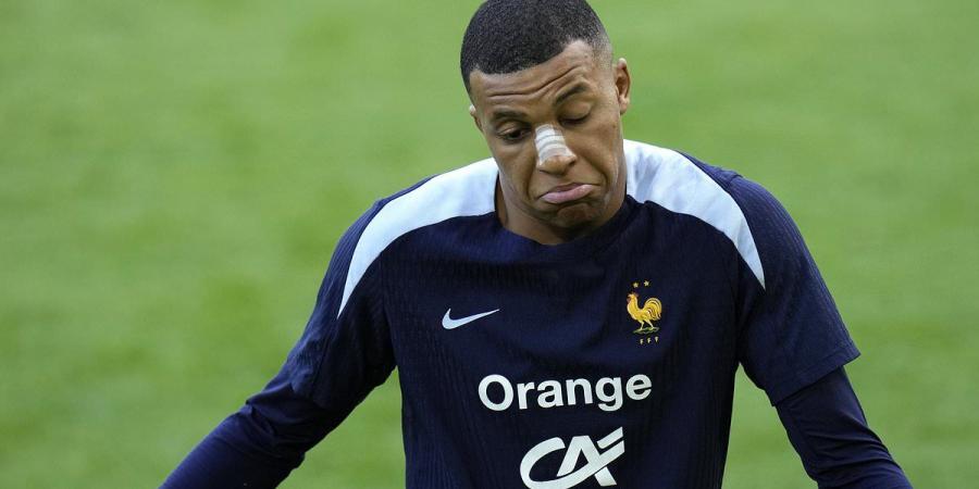 Kylian Mbappe is pictured in training for the first time since breaking his nose during France's victory over Austria amid doubts over Real Madrid star's participation in the rest of Euros group stages