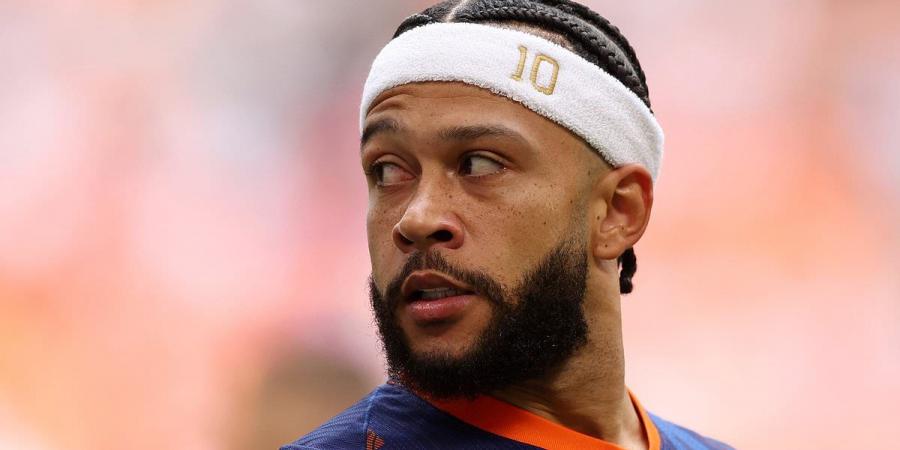 Memphis Depay showcases bizarre custom headband in the Netherlands' opening Euro 2024 win over Poland... with shocked fans insisting 'his aura is untouchable'