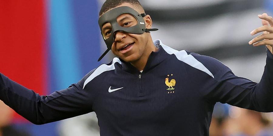 Kylian Mbappe shows off his new protective mask at Euro 2024 after being banned from using former French design as the superstar continues to recover from a broken nose