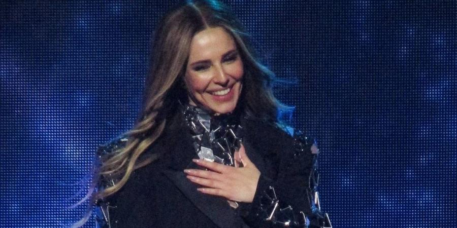 Girls Aloud halt their Liverpool show for Cheryl to 'clear up' viral video as band's nostalgic UK reunion tour comes to an end