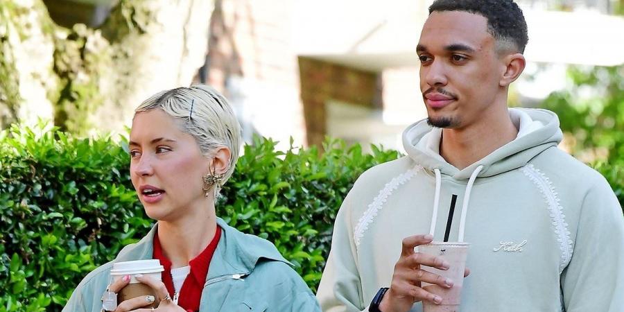 Iris Law cheers on 'boyfriend' Trent Alexander-Arnold as he scores the winning penalty against Switzerland to send England through to European Championships semi-finals