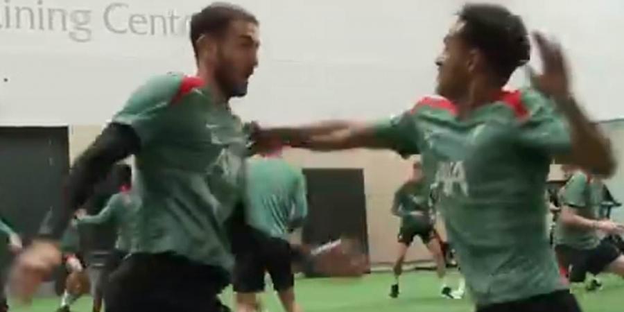 Liverpool fans left baffled by pre-season training under new manager Arne Slot - as clip of Reds players 'shooting guns' and fighting each other goes viral