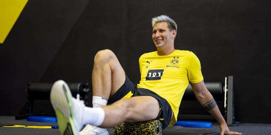 Borussia Dortmund star looks unrecognisable after dramatic weight loss... following images of him appearing out of shape before the Champions League final