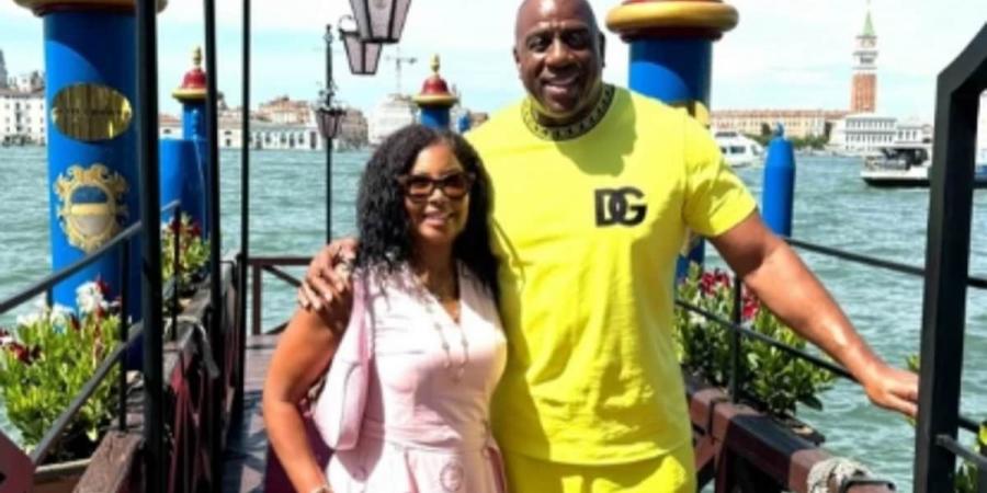 Basketball legend Magic Johnson sports a VERY bold Dolce & Gabbana outfit in Venice as he soaks up the sun on boat trip with his wife Cookie