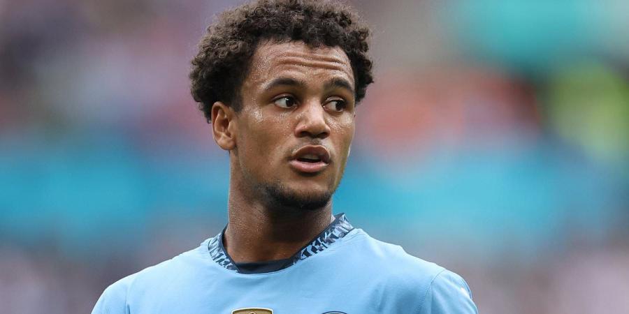 Man City suffer injury blow as Oscar Bobb fractures a bone in his leg on the eve of the new season... with the young winger set to face months on the sidelines