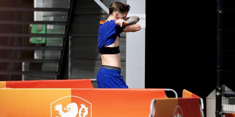 Netherlands camp is rocked by row between Wout Weghorst and Arsenal defender Jurrien Timber... with Ronald Koeman having to separate the pair before former Man United striker storms off